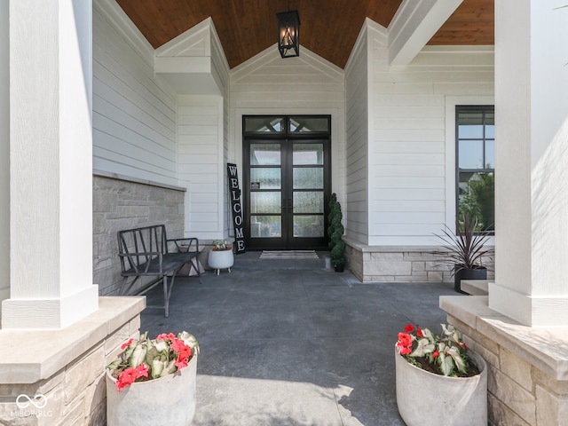property entrance featuring french doors