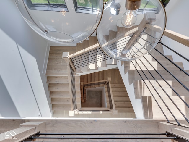 stairway with wood walls