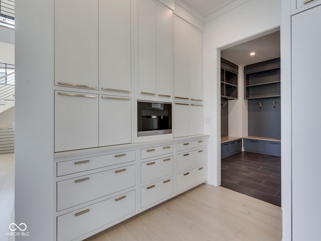 spacious closet with light wood-style flooring