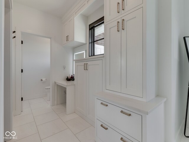 mudroom featuring light tile patterned floors