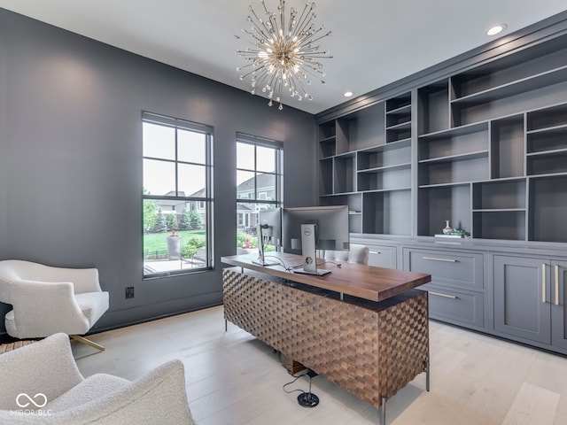 home office featuring light wood finished floors, a chandelier, and recessed lighting