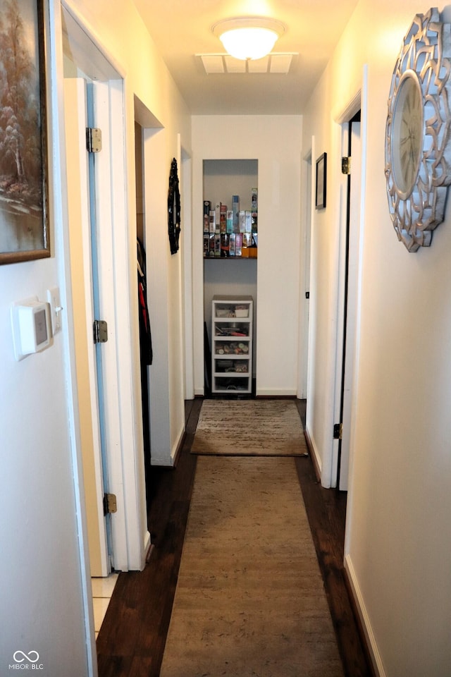 706 Bobs Ct, Beech Grove, IN 46107 - corridor with dark wood-type flooring and baseboards