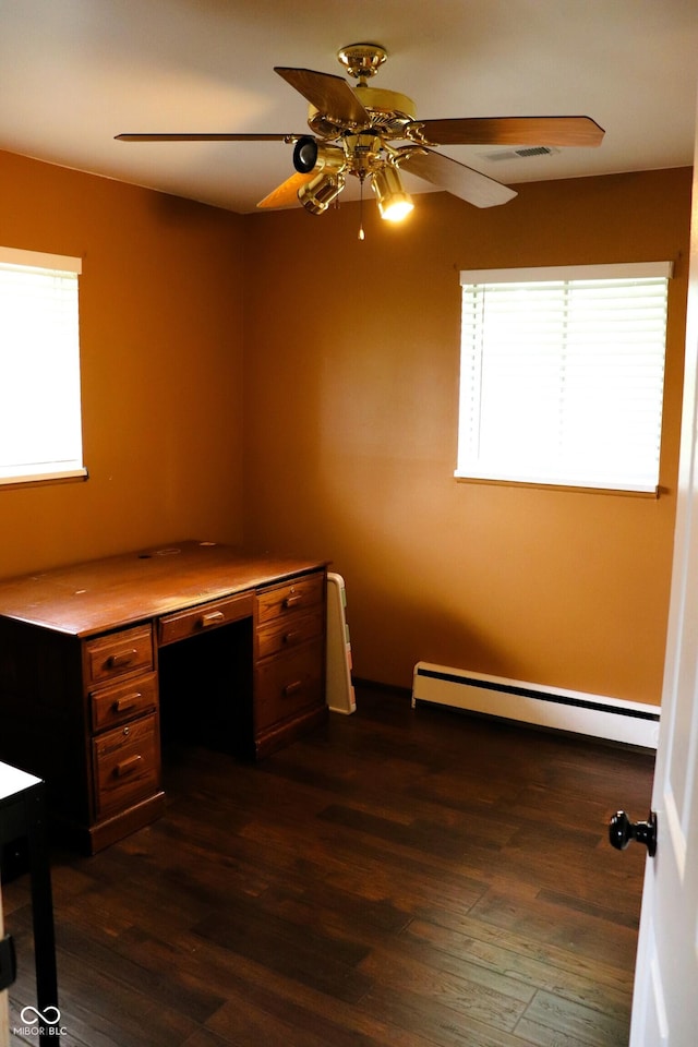 706 Bobs Ct, Beech Grove, IN 46107 - unfurnished office featuring a baseboard heating unit, plenty of natural light, a ceiling fan, and dark wood-style flooring