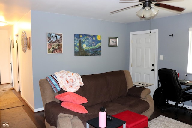 706 Bobs Ct, Beech Grove, IN 46107 - living area with wood finished floors, ceiling fan, and baseboards