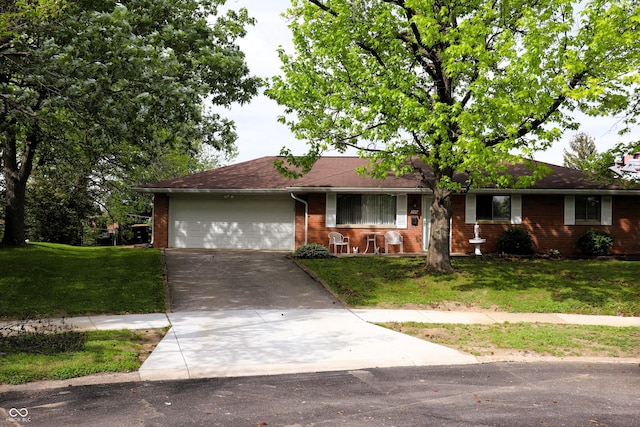 706 Bobs Ct, Beech Grove, IN 46107 - ranch-style house featuring brick siding, concrete driveway, an attached garage, and a front lawn