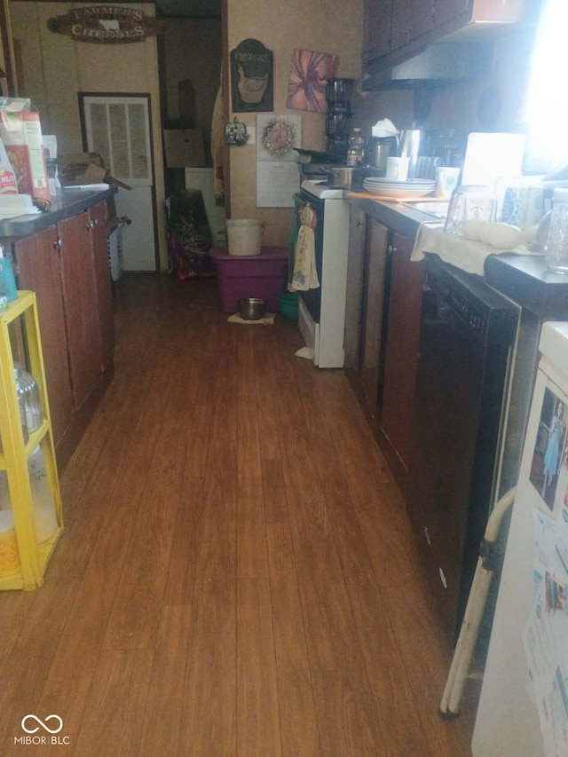 kitchen with hardwood / wood-style flooring