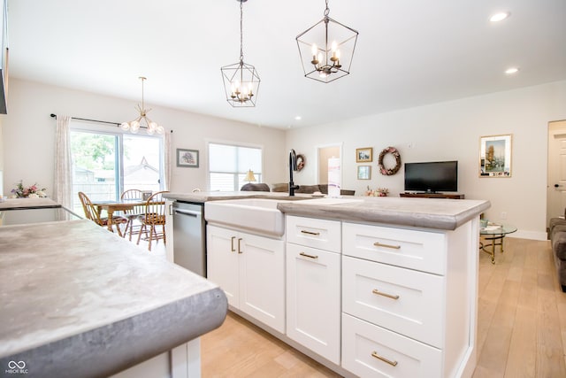2686 Lafayette Ave, Columbus, IN 47201 - kitchen featuring open floor plan, a chandelier, dishwasher, recessed lighting, and a sink