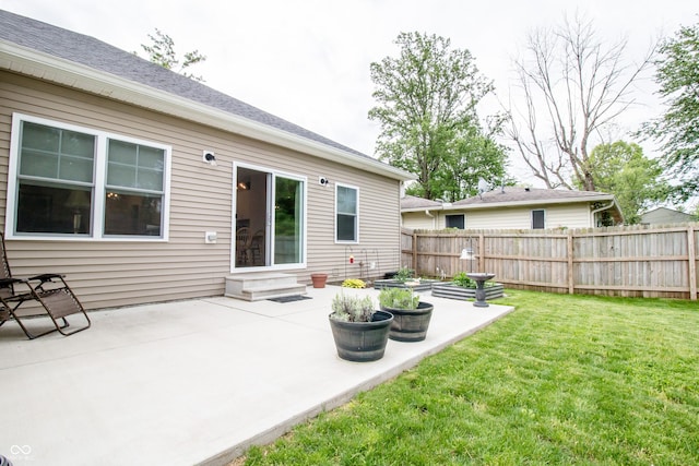 2686 Lafayette Ave, Columbus, IN 47201 - back of property with a patio area and entry steps