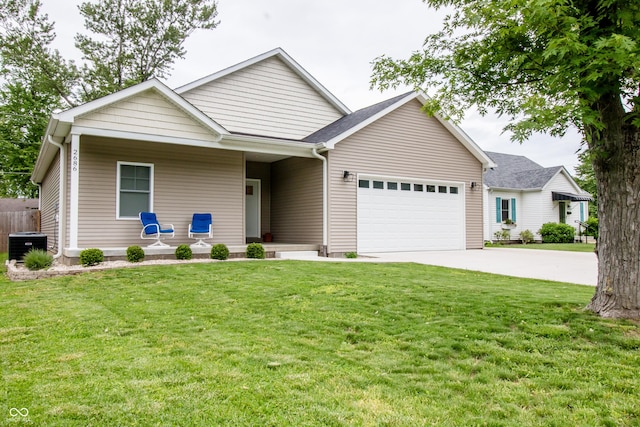 2686 Lafayette Ave, Columbus, IN 47201 - single story home with a garage, covered porch, a front lawn, and concrete driveway