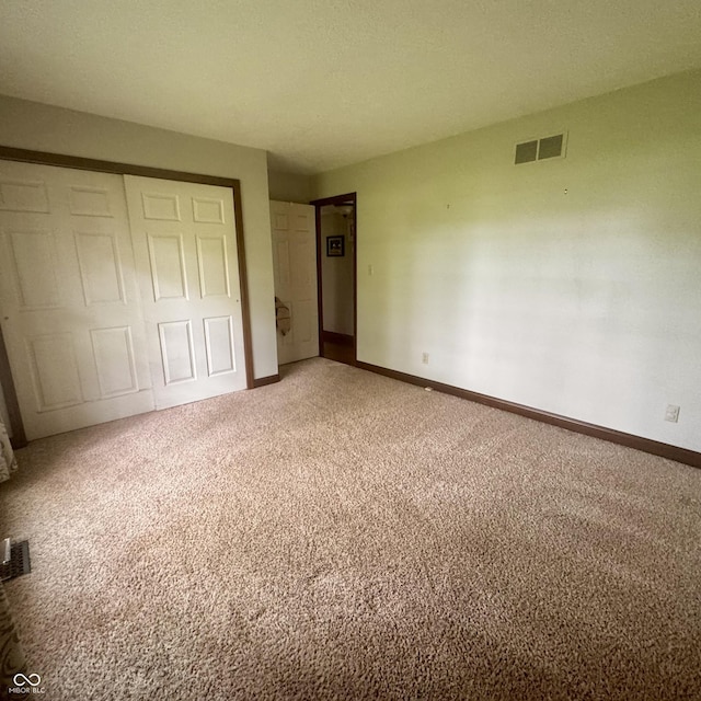 3559 S County Road 475 E, Plainfield, IN 46168 - unfurnished bedroom featuring light carpet, a closet, and baseboards
