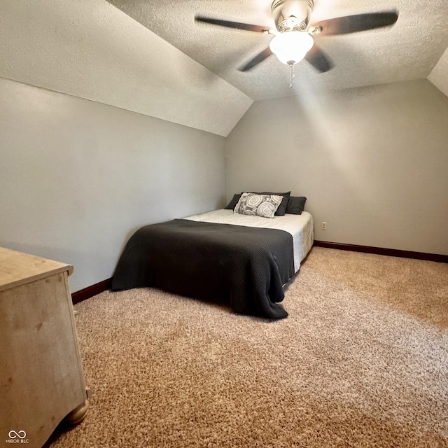 3559 S County Road 475 E, Plainfield, IN 46168 - carpeted bedroom featuring lofted ceiling, a textured ceiling, baseboards, and a ceiling fan
