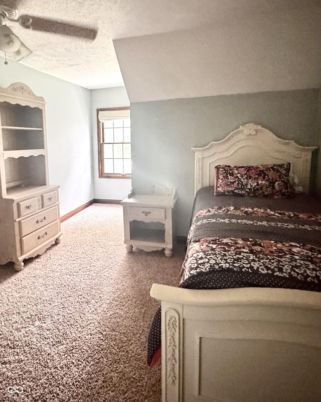 3559 S County Road 475 E, Plainfield, IN 46168 - bedroom featuring carpet floors, a textured ceiling, baseboards, and ceiling fan