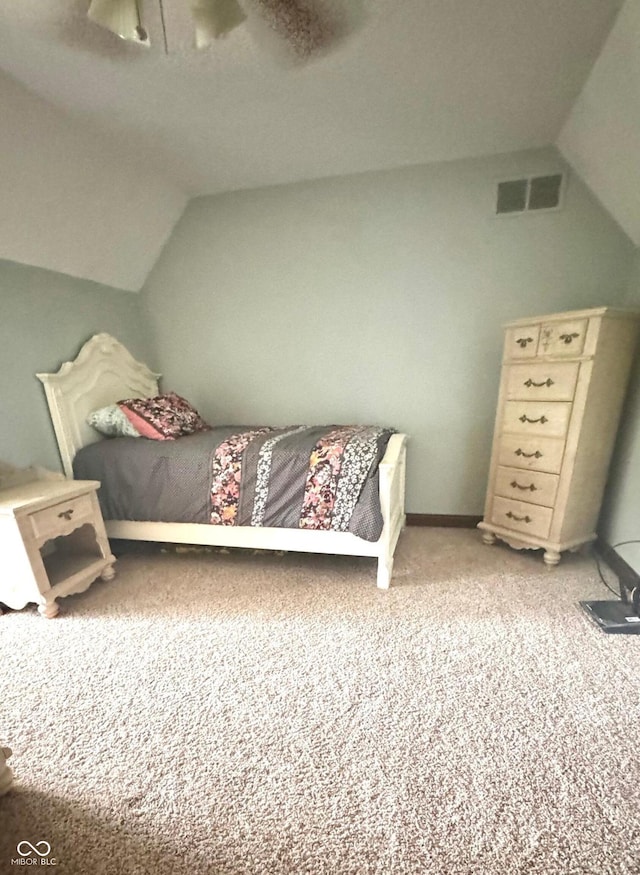 3559 S County Road 475 E, Plainfield, IN 46168 - bedroom with vaulted ceiling, light colored carpet, and a ceiling fan