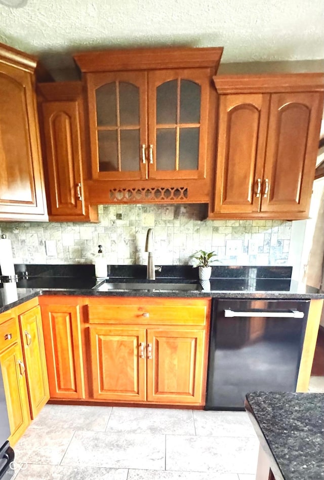 3559 S County Road 475 E, Plainfield, IN 46168 - kitchen with a sink, dishwasher, decorative backsplash, dark stone counters, and a textured ceiling