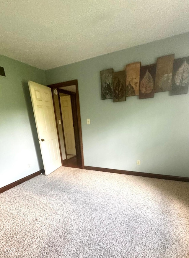 3559 S County Road 475 E, Plainfield, IN 46168 - carpeted spare room with baseboards and a textured ceiling