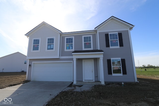 7323 Waylon Way, Indianapolis, IN 46239 - view of front of house with a garage and driveway