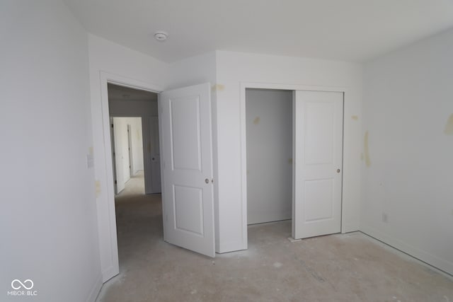 7323 Waylon Way, Indianapolis, IN 46239 - unfurnished bedroom featuring baseboards and a closet
