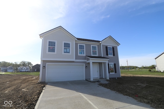 7323 Waylon Way, Indianapolis, IN 46239 - view of front of house with concrete driveway and an attached garage