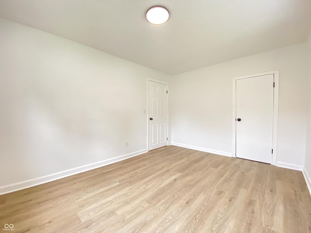 453 Illinois St, Fortville, IN 46040 - empty room featuring light wood finished floors and baseboards
