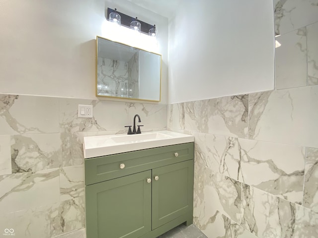 453 Illinois St, Fortville, IN 46040 - bathroom featuring vanity, tile walls, and a wainscoted wall