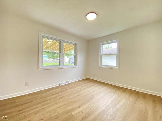 453 Illinois St, Fortville, IN 46040 - spare room featuring light wood finished floors and baseboards