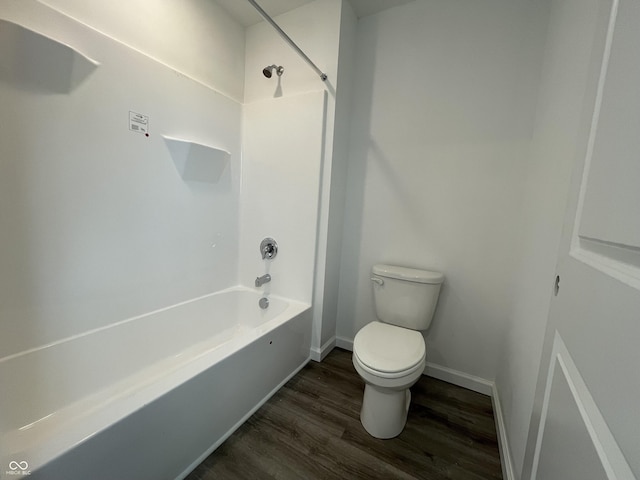 1204 Mcbride St, Greenfield, IN 46140 - full bathroom featuring wood finished floors and bathtub / shower combination
