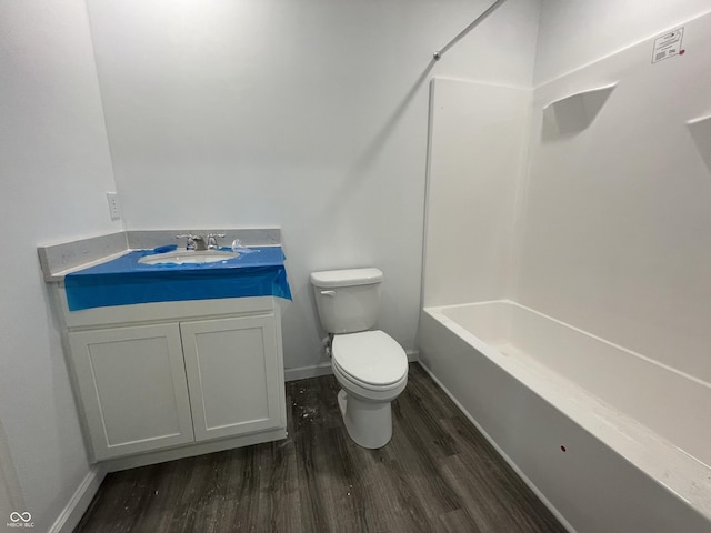 1204 Mcbride St, Greenfield, IN 46140 - full bathroom featuring wood finished floors, vanity, and bathing tub / shower combination