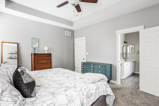 11419 Niagara Dr, Fishers, IN 46037 - bedroom with carpet floors, a sink, a ceiling fan, baseboards, and connected bathroom