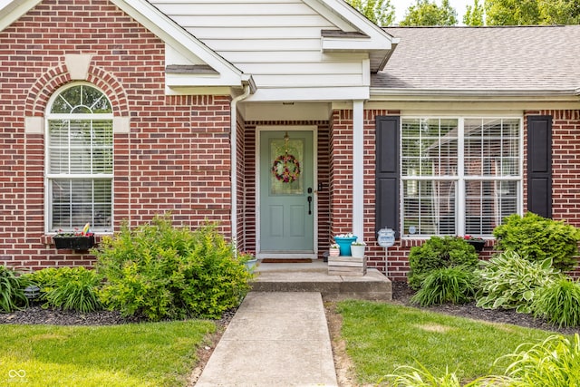 11419 Niagara Dr, Fishers, IN 46037 - view of exterior entry with brick siding and a shingled roof