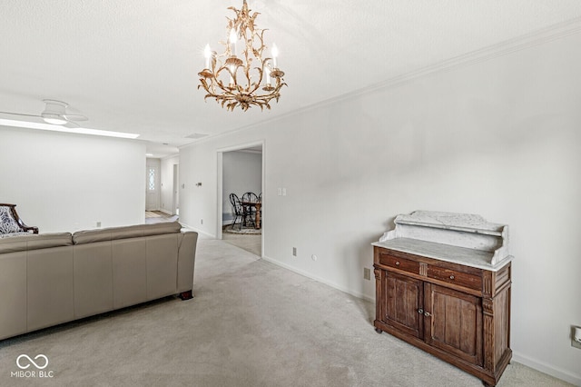 12388 Camberley Ln, Carmel, IN 46033 - living area featuring light carpet, a chandelier, baseboards, and crown molding