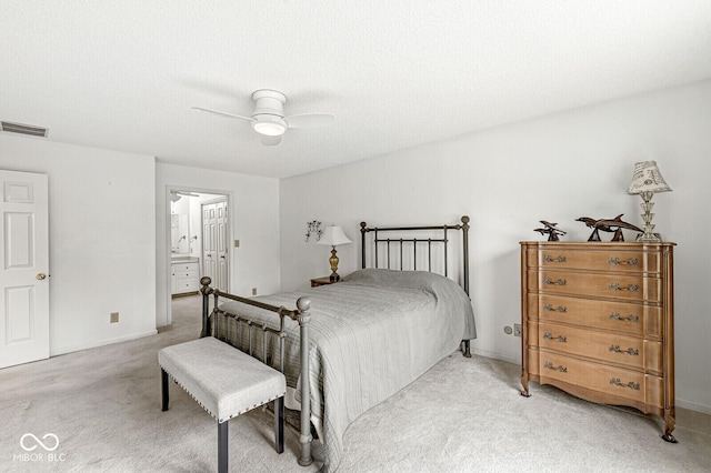 12388 Camberley Ln, Carmel, IN 46033 - bedroom featuring light colored carpet, ceiling fan, and baseboards
