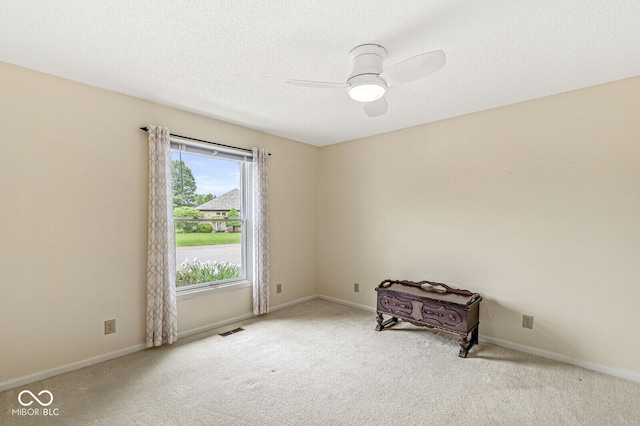 12388 Camberley Ln, Carmel, IN 46033 - carpeted spare room featuring a ceiling fan and baseboards
