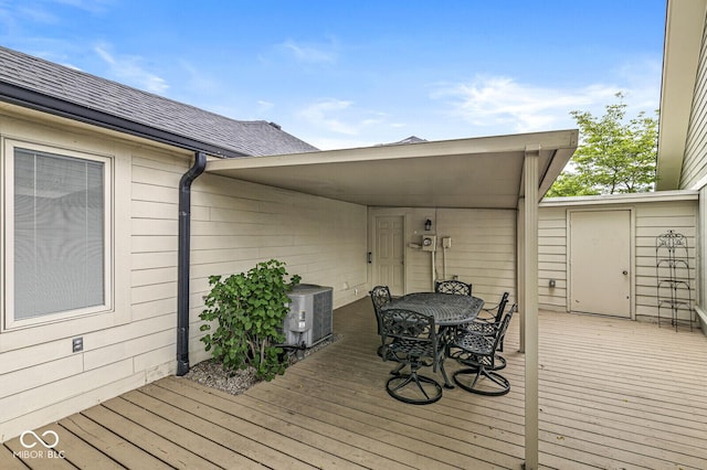 12388 Camberley Ln, Carmel, IN 46033 - wooden deck with cooling unit and outdoor dining space