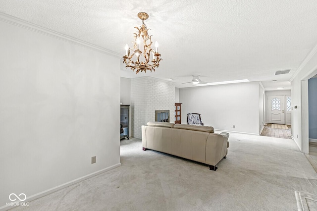 12388 Camberley Ln, Carmel, IN 46033 - carpeted living room featuring a chandelier, a brick fireplace, a textured ceiling, baseboards, and a ceiling fan