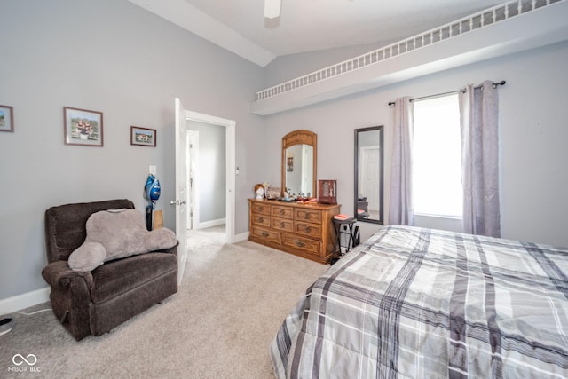 bedroom featuring vaulted ceiling, carpet floors, ceiling fan, and baseboards