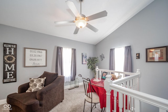 bedroom with carpet flooring, multiple windows, baseboards, a ceiling fan, and high vaulted ceiling
