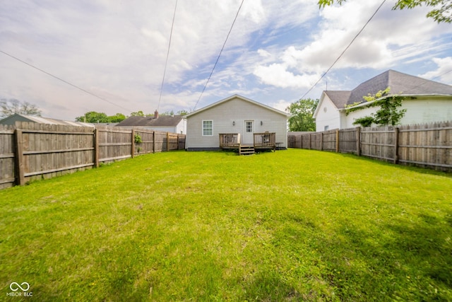 view of yard featuring a wooden deck
