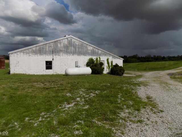 9739 S County Road 825 E, Cloverdale, IN 46120 - view of property exterior with an outbuilding and a yard