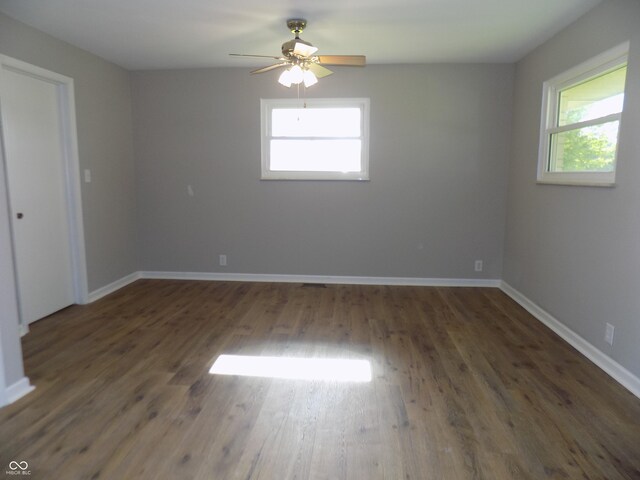 9739 S County Road 825 E, Cloverdale, IN 46120 - spare room with healthy amount of natural light, wood finished floors, ceiling fan, and baseboards