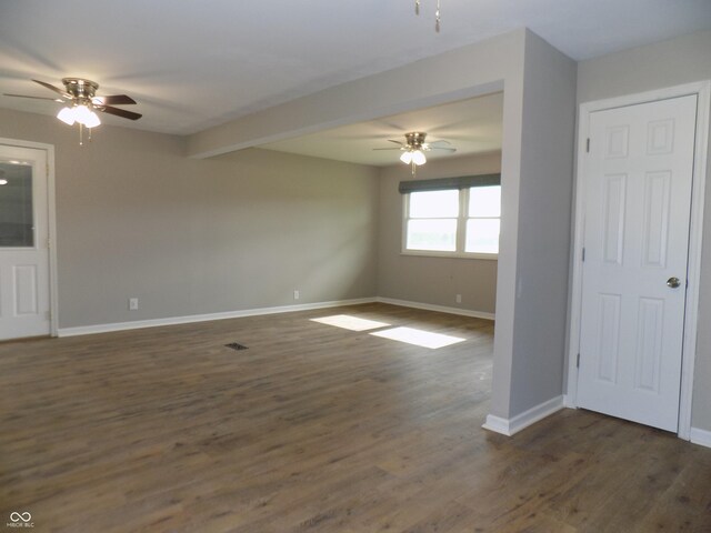 9739 S County Road 825 E, Cloverdale, IN 46120 - unfurnished room featuring a ceiling fan, dark wood-style flooring, and baseboards