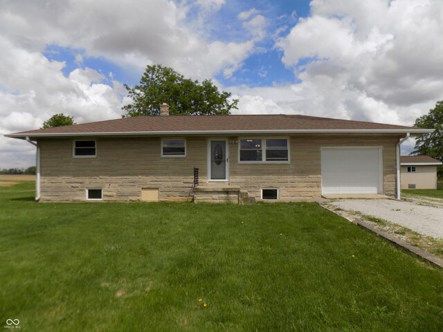 9739 S County Road 825 E, Cloverdale, IN 46120 - view of front of property featuring a garage, a chimney, a front yard, and gravel driveway