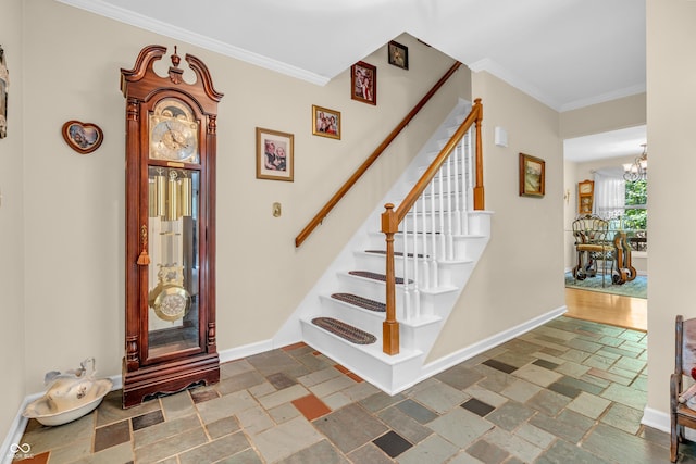 610 N Forest Rd, Crawfordsville, IN 47933 - stairs featuring stone tile floors, ornamental molding, baseboards, and a chandelier