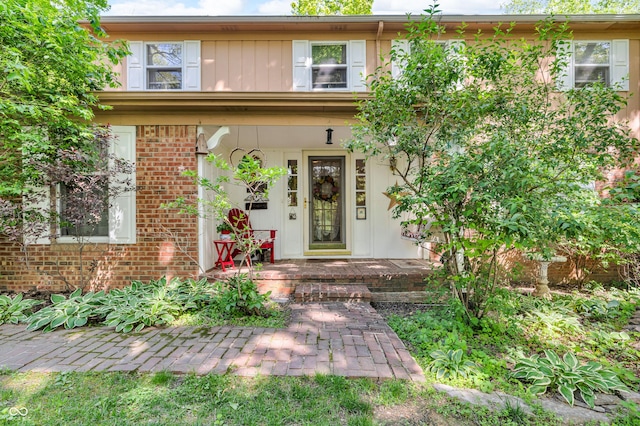 610 N Forest Rd, Crawfordsville, IN 47933 - property entrance with covered porch and brick siding