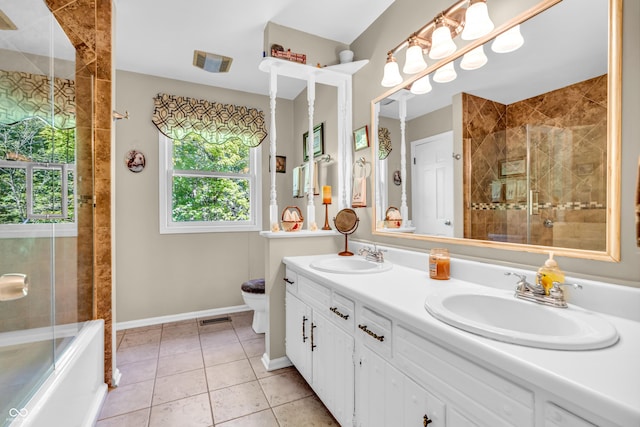 610 N Forest Rd, Crawfordsville, IN 47933 - full bathroom with toilet, baseboards, tile patterned flooring, and double vanity