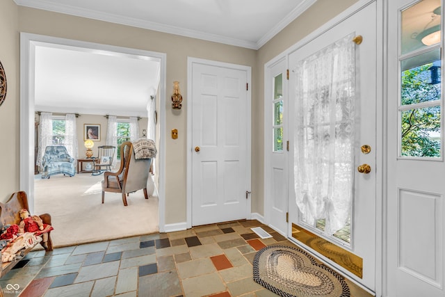 610 N Forest Rd, Crawfordsville, IN 47933 - foyer with crown molding, stone tile floors, carpet floors, and baseboards