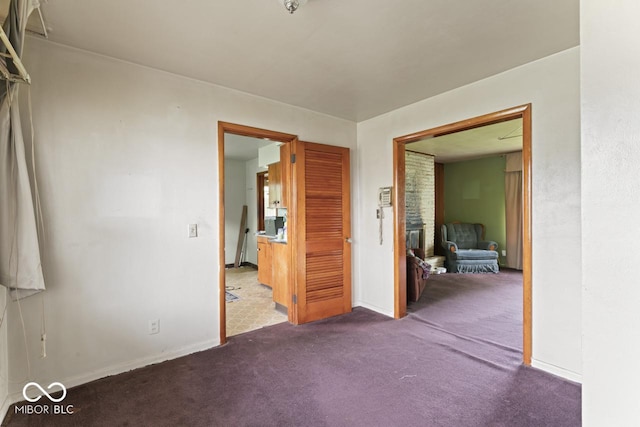 2840 W 12th St, Anderson, IN 46011 - carpeted empty room with baseboards