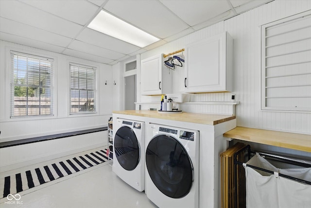 1132 Evison St, Indianapolis, IN 46203 - washroom with washing machine and clothes dryer and cabinet space