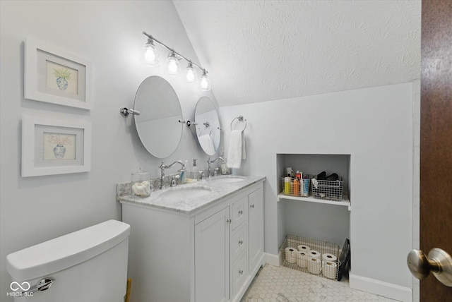 1132 Evison St, Indianapolis, IN 46203 - bathroom featuring double vanity, toilet, tile patterned floors, and baseboards