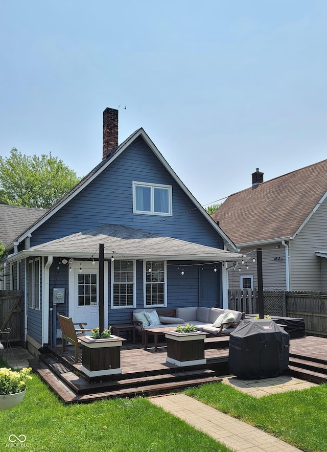 1132 Evison St, Indianapolis, IN 46203 - rear view of property featuring an outdoor hangout area, a deck, and a chimney
