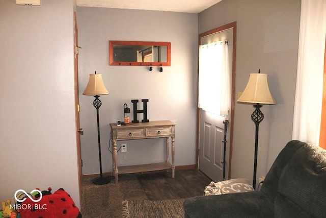 7 Gladiator Dr, Waynetown, IN 47990 - living area featuring wood finished floors and baseboards